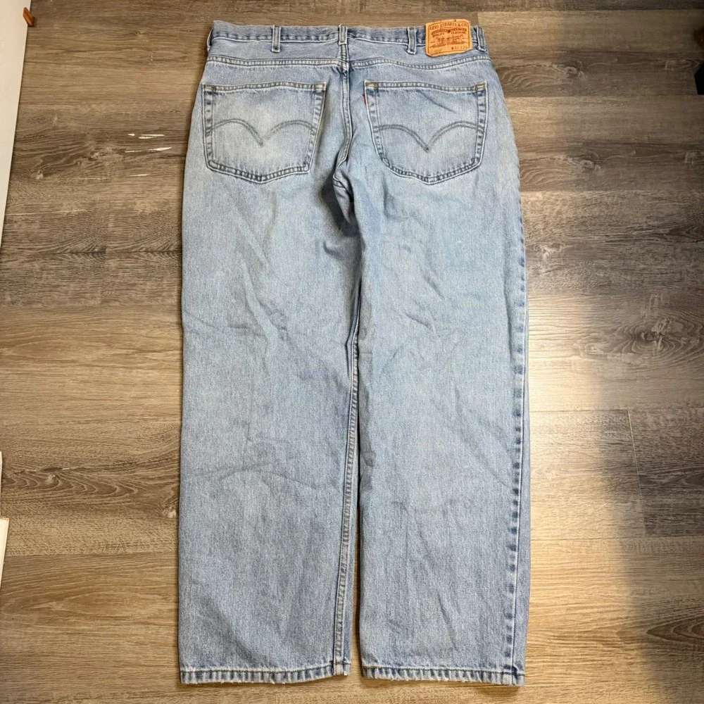 Vintage Levis 550 Relaxed Fit Tapered Leg Light Wash Jeans Mens 38x29 Distressed